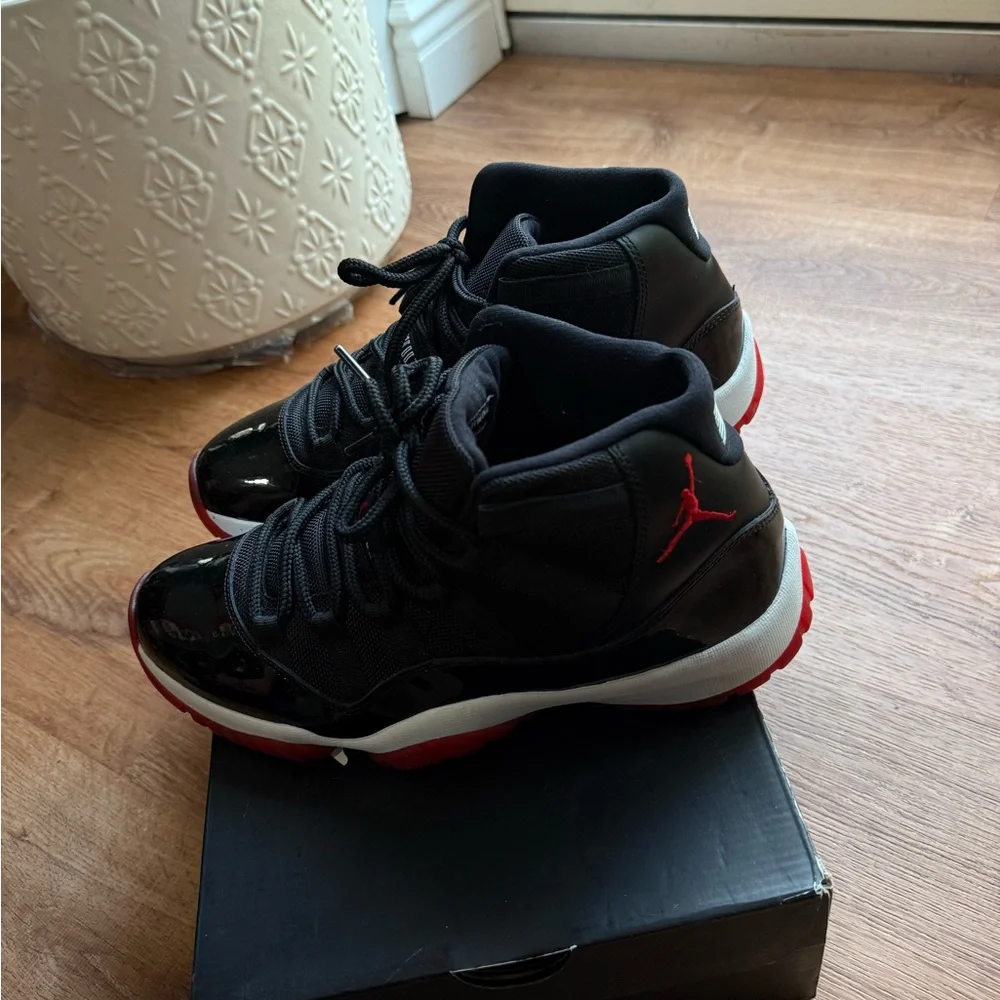 Air Jordan 11 Bred Black and Red High-Top Basketball Sneakers